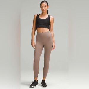 Lululemon Wunder Train High-Rise Ribbed Tight 25"
Taupetastic size 6